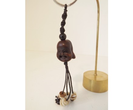 7102035 Sleutelhanger hoofd lucky boeddha met kralen 2,5 cm. Per 12 stuks verpakt. Prijs is per 12 stuks.